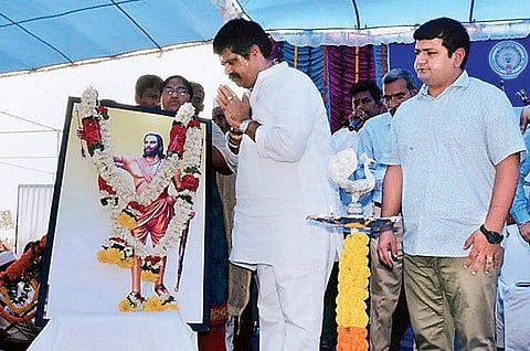 Minister for Tourism Avanthi Srinivasa Rao paying tributes to Alluri Sitaramaraju  on the occasion of his 122nd birth anniversary at Pandrangi, the birth place of the revolutionary leader in Visakhapatnam district on Thursday | express