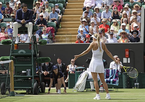 Zhang into last 16 as Wozniacki claims Hawk-Eye has blackspot
