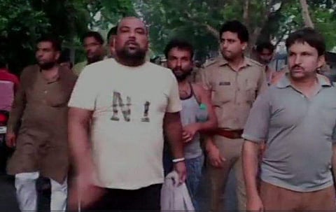 the accused were seen having bananas while being taken to the jail by two constables (Photo| ANI)