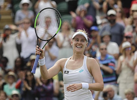 United States' Alison Riske celebrates defeating Australia's Ashleigh Barty in a women's singles match during day seven of the Wimbledon Tennis Championships in London. (Photo | AP)