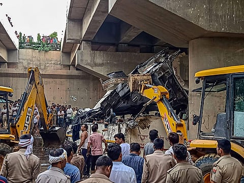 Rescue operations underway after a bus skidded off the six-lane Yamuna Expressway and fell into a large drain near Agra Monday July 8 2019. | PTI