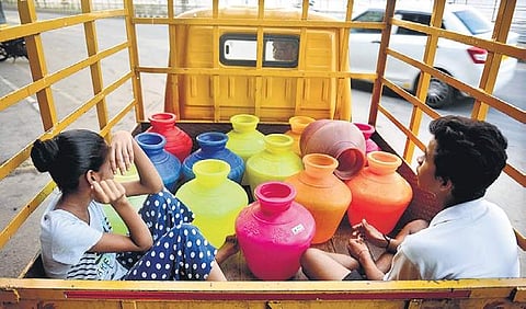 Water starved residents of Chennai collect as much drinking water as possible from a government-run Metro Water filling station in the city. ( Photo | EPS)