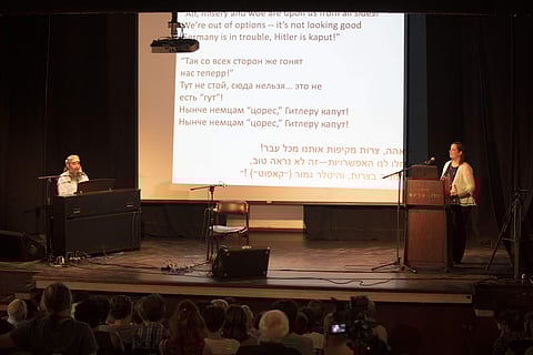 In this Sunday, July 7, 2019 photo, Russian Jewish songwriter Psoy Korolenko, left, and Canadian historian Anna Shternshis perform a song from 'Yiddish Glory,' a Grammy-nominated project that brings to life the lost songs of World War II, in Tel Aviv, Isr