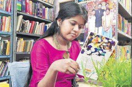 12-year-old Yashoda Shenoy at her library at Mattanchery