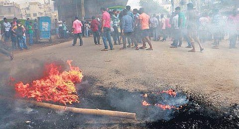 Locals staging road blockade at Rasulgarh square protesting the attack on a hotel owner on Wednesday | Irfana