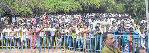 People gather during the funeral of the coffee tycoon |express