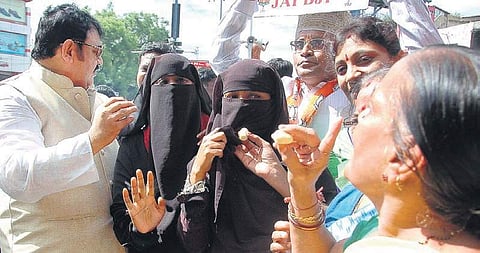 BJP workers celebrate the passing of the Triple Talaq Bill in the Parliament in Hyderabad on Wednesday | Express