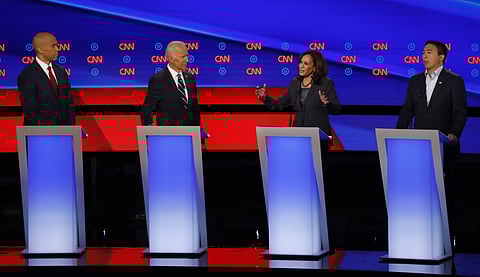 From left, Sen. Cory Booker, D-N.J., former Vice President Joe Biden, Sen. Kamala Harris, D-Calif., and Andrew Yang. (Photo | AP)