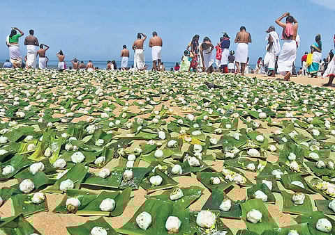 The offerings kept at Papanasam beach in Varkala as part of  the balitharpan (paying obeisance to ancestors) ritual on the occasion of ‘Karkkidaka Vavu’ on Wednesday.  Hundreds thronged the beach since the wee hours of Wednesday for the annual ritual | B 