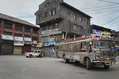 A state transport bus leaves the region during restrictions in Srinagar Thursday August 8 2019. | PTI