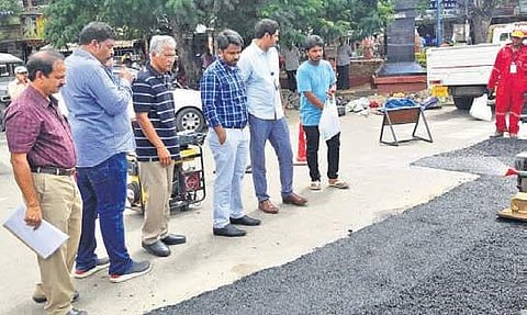 VMC commissioner Prasanna Venkatesh inspecting road works at MG Road (Photo |EPS)