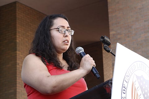 Jessica Coca Garcia stands in front of her wheelchair addressing those gathered at the League of United Latin American Citizens' 'March for a United America' Saturday, Aug. 10, 2019 in El Paso, Texas. | ( Photo | AP )