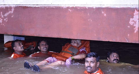 A NDRF team rescues an old woman in Pune (File Photo | ANI)