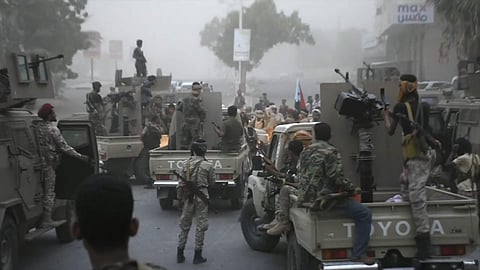 Southern Transitional Council separatist fighters line up to storm the presidential palace in the southern port city of Aden, Yemen. (Photo | AP)