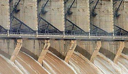 Water gushing out of the gates of Almatti dam, leaving a  trail of destruction in its wake | Express