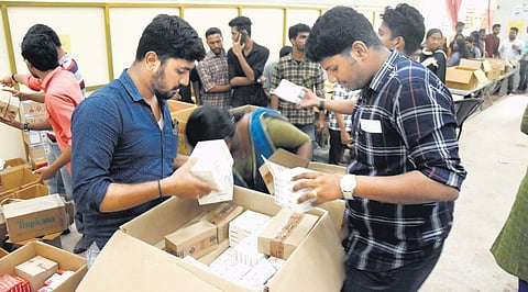 Relief materials being collected and packed by volunteers at the corporation's collection centre in Government Women's College (Photo |EPS, B P Deepu)