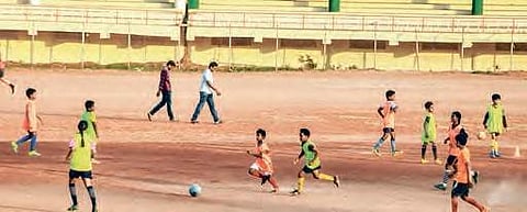 Children playing football at IGMC Stadium (File Photo | RVK Rao)