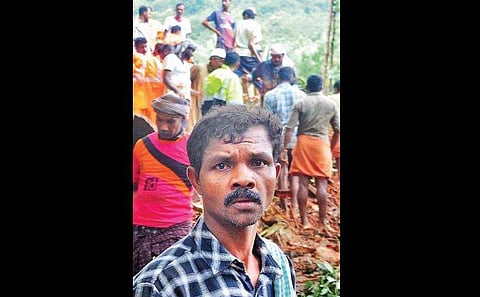 Sunil who is desolate after missing seven members of his family to a landslide at Kavalappara. (Photo | A Sanesh)