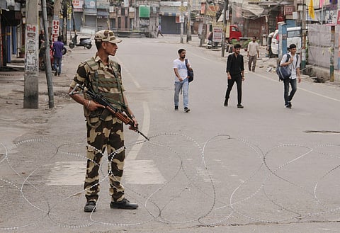 Security personnel stand guard during restrictions in Jammu. (Photo| PTI)