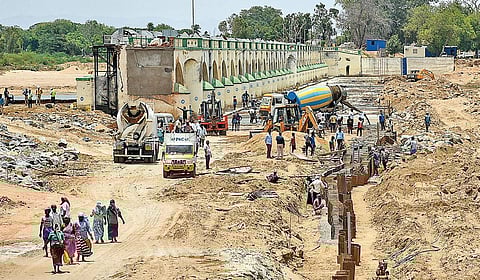 Work underway to build a temporary barrage in Mukkombu on Monday | MK Ashok Kumar