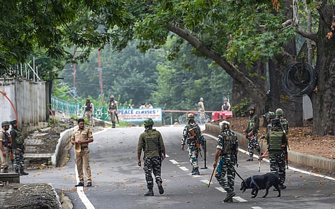 Security personnel guard near the Sher-e-Kashmir Cricket Stadium during the 73rd Independence Day functions in Srinagar Thursday August 15 2019. | PTI