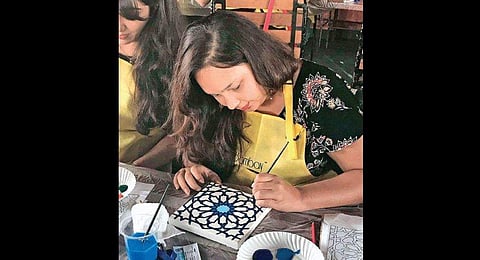 Snapshots from a previous Moroccan mosaic painting workshop.