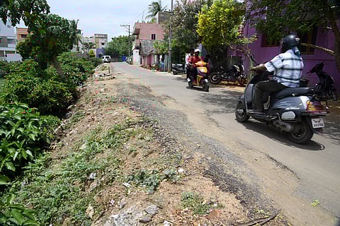 Month-old road that connects the Maduravoyal bypass service road to residential areas in Adayalampattu village in Maduravoyal has worn out