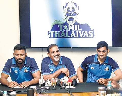 Tamil Thalaivas coach E Bhaskaran (centre) addressing the media on Friday