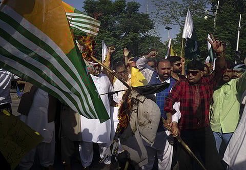 Pakistan civilians  burn an effigy of Indian leaders during an anti-India rally (Photo | AP)