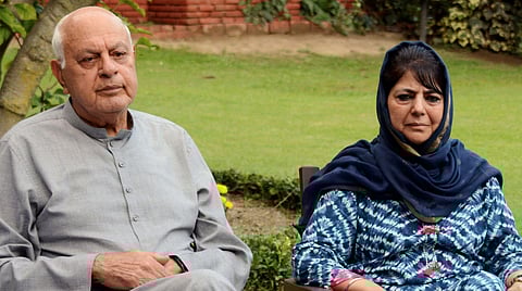 National Conference President Farooq Abdullah with PDP President and former chief minister Mehbooba Mufti during an all-party meeting regarding the current situation in Kashmir in Srinagar on 4 August 2019. (Photo | PTI)