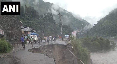 Movement of vehicular traffic has stopped near Chamba bus stand after a portion of the road was damaged due to continuous rainfall. (Photo | ANI Twitter)