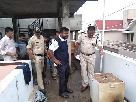 Police at the accident site in government hostel in Koppal. (Photo | EPS)