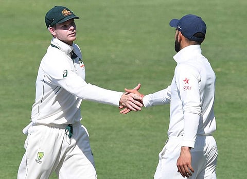 Steve Smith (L) and India's captain Virat Kohli. (Photo | AFP)