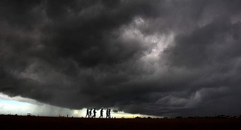 Dark clouds shroud the sky near Marina Beach in Chennai. (Photo | Debadatta Mallick, EPS)