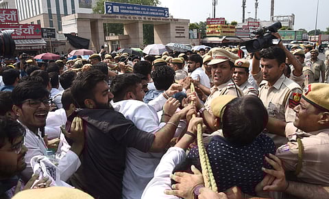 Police personnel try to control a protest by doctors and medical students against the National Medical Commission (NMC) Bill near All India Institutes of Medical Sciences AIIMS in New Delhi. | (Parveen Negi | EPS)
