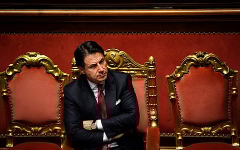 Italian Prime Minister Giuseppe Conte reacts after delivering a speech at the Italian Senate, in Rome. (Photo | AFP)