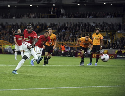 Paul Pogba pulled his jersey over his face when the final whistle sounded, his latest spot-kick failure costing Manchester United two points and casting doubt over the wisdom of the team rotating its penalty-takers. (Photo | AP)