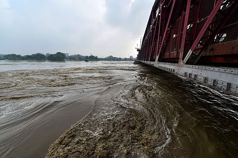 The Ganga, Yamuna, Ghaghara and several other rivers in Uttar Pradesh are in spate due to heavy rains in neighbouring states, leading to floods in low-lying areas. IN PIC: The Yamuna overflows from Hathinikund Barrage, in New Delhi/ PTI.
