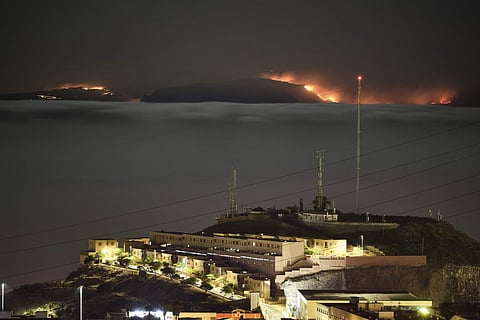 The fire on the mountains of the Canary Islands in this view taken from Santa Cruz de Tenerife island, Spain. (Photo | AP)