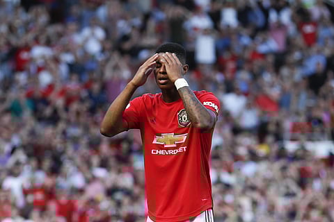 Manchester United's Marcus Rashford reacts after missing to score on a penalty kick during the English Premier League soccer match between Manchester United and Crystal Palace at Old Trafford in Manchester. (Photo | AP)