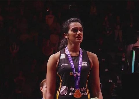PV Sindhu scripted a historic win becoming the first Indian to win the World Championship. The victory becomes even sweeter for the Indian shuttler as it comes on her mother's birthday.  (Photo | @BAI_Media, Twitter)