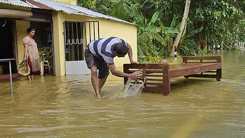 A native cleaning his submerged house at Mangalam in Chengannur, Alappuzha (File | Express photo)