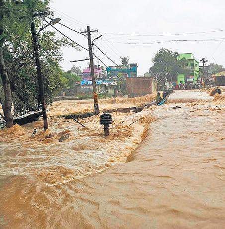 File photo of water flowing over a road in Balangir