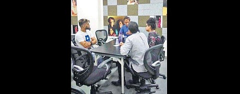 People listen to a human book during an event organised by the Delhi chapter of Human Library | India HIV/AIDS Alliance