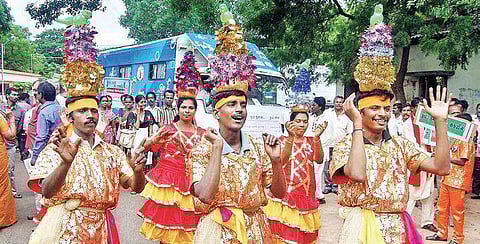 Students performing Karakattam