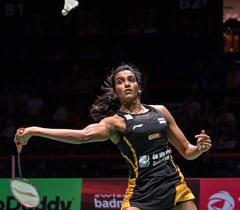 India's Pusarla V. Sindhu returns a shuttlecock to Japan's Nozomi Okuhara during their women's singles final match at the BWF Badminton World Championships in Basel, Switzerland, Sunday, Aug. 25, 2019.  | AP