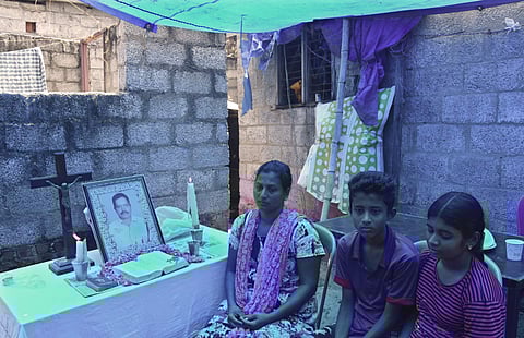 Johnson’s wife Shalini, children Abhi and Athira at their house (Photo | B P Deepu, EPS)