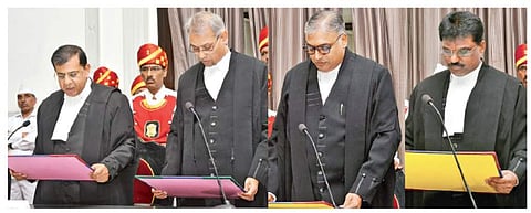 Chief Justice of Telangana High Court Raghvendra Singh Chauhan administers the oath of office to three new judges T Vinod Kumar, A Abhishek Reddy and K Lakshman as judges of the High Court in Hyderabad on Monday | EXPRESS PHOTO