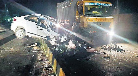 The  car which jumped a road median and crashed into a tipper on Attibele-Sarjapur Road on Monday night | Express