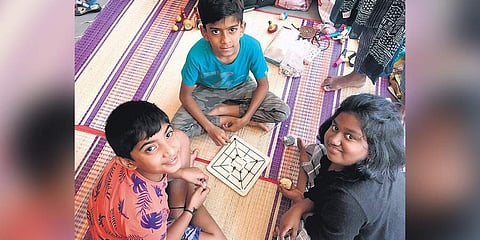 A bunch of kids play traditional games at Kavade. (Photo | Express)